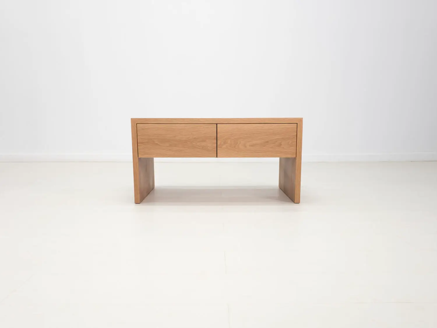 DREW coffee table in natural white oak featuring a seamless grain pattern and modern design