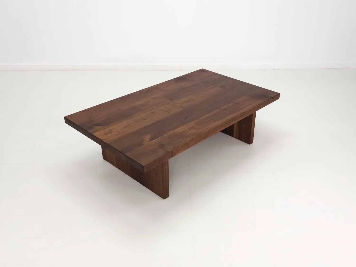 Walnut LILY coffee table finished with a water  and stain resistant hardwax oil