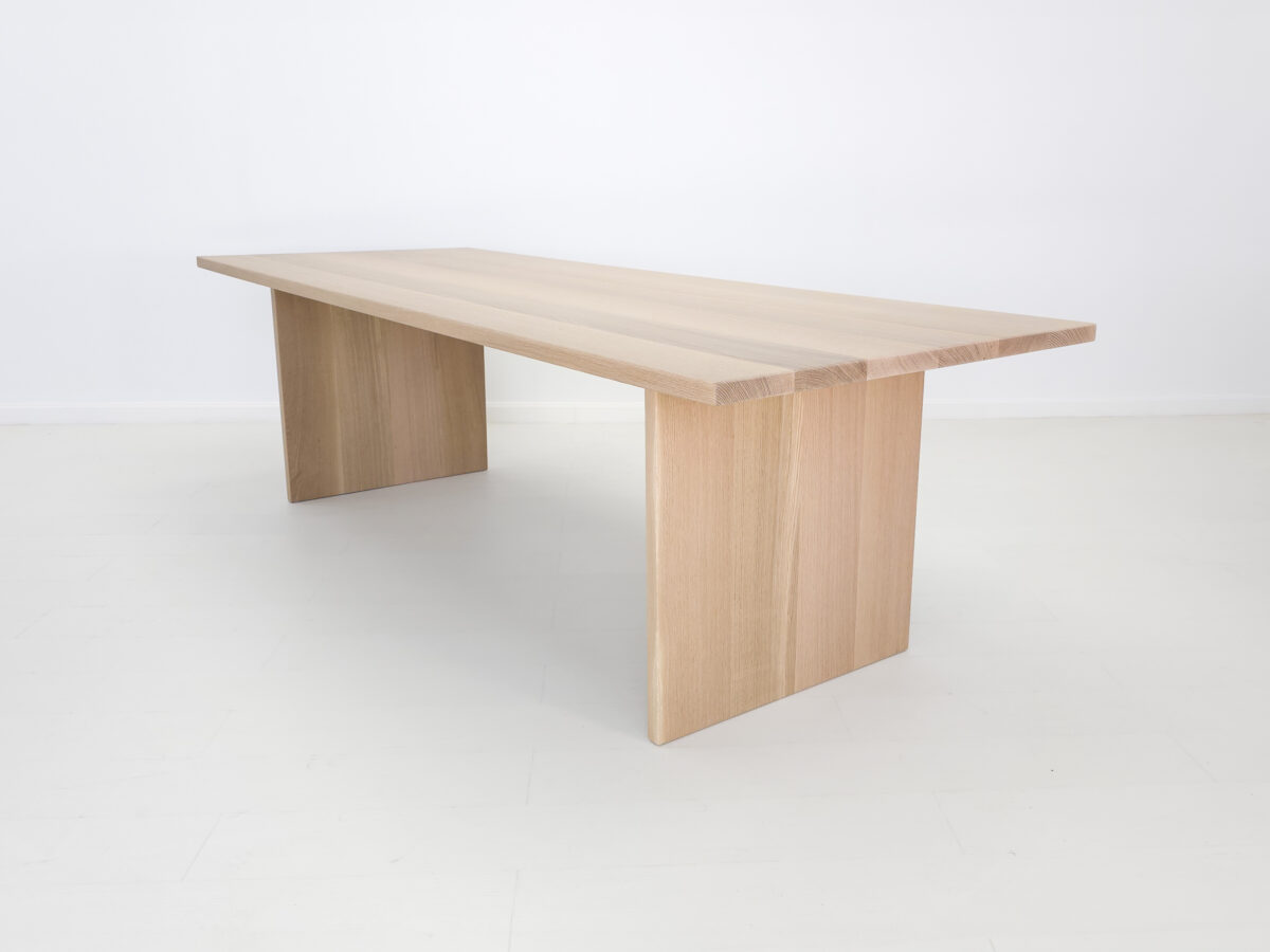 Custom LILY table in white oak showcasing its light tones and timeless design