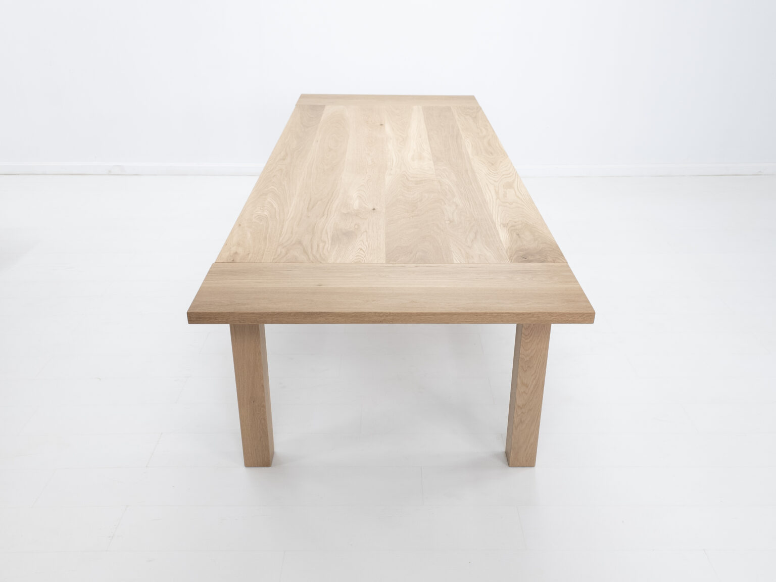 Light oak wood dining table