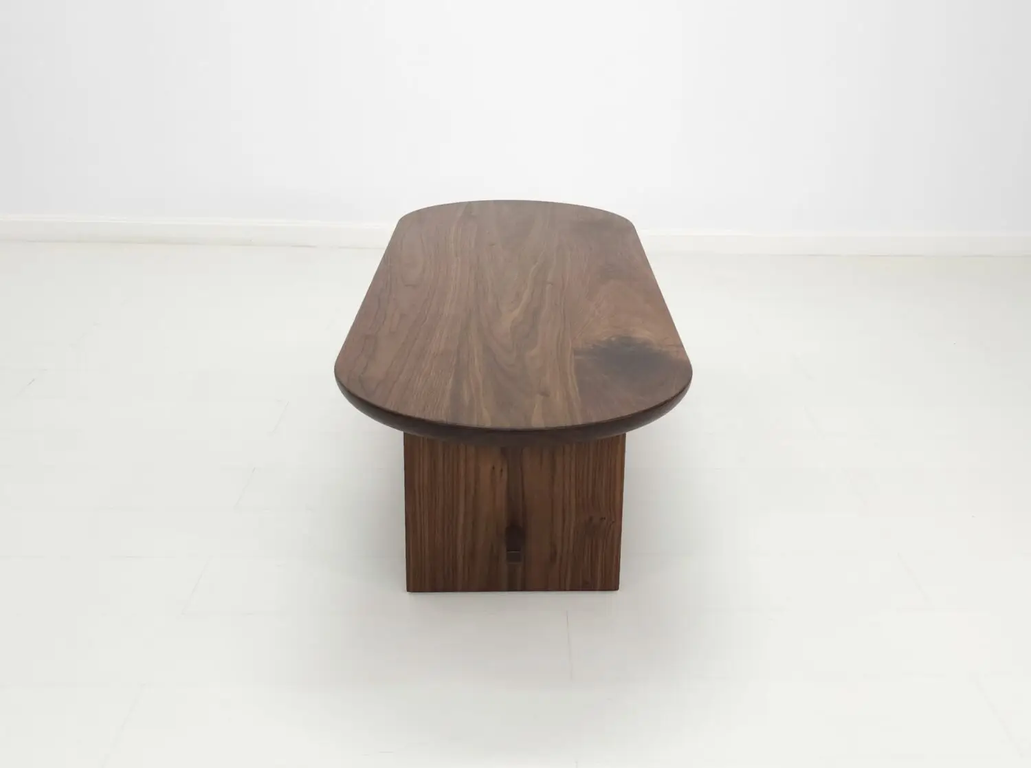 MIRA coffee table in solid American hardwood with a 1½ inch thick capsule shaped top