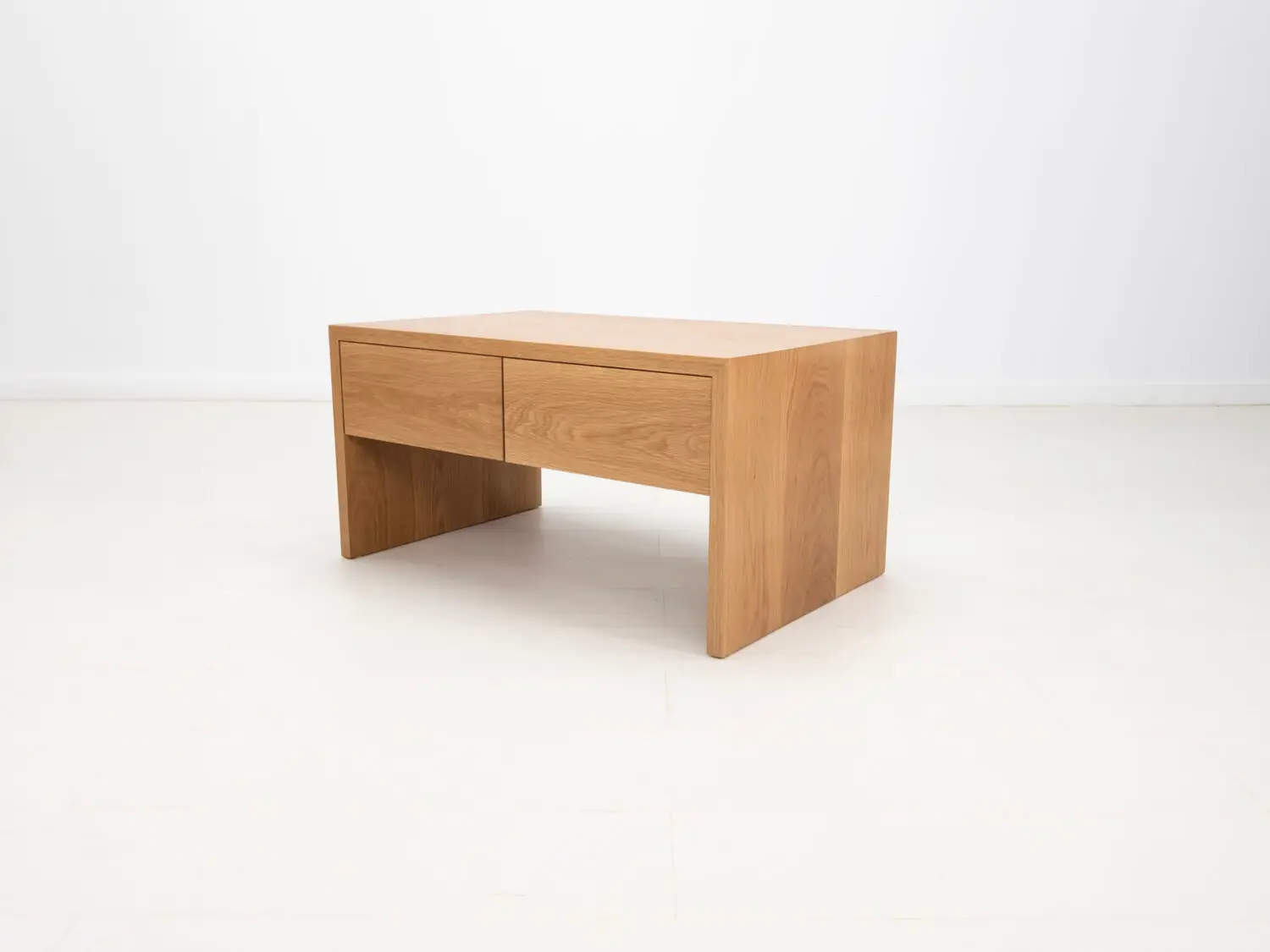 DREW coffee table in natural white oak featuring a seamless grain pattern and modern design
