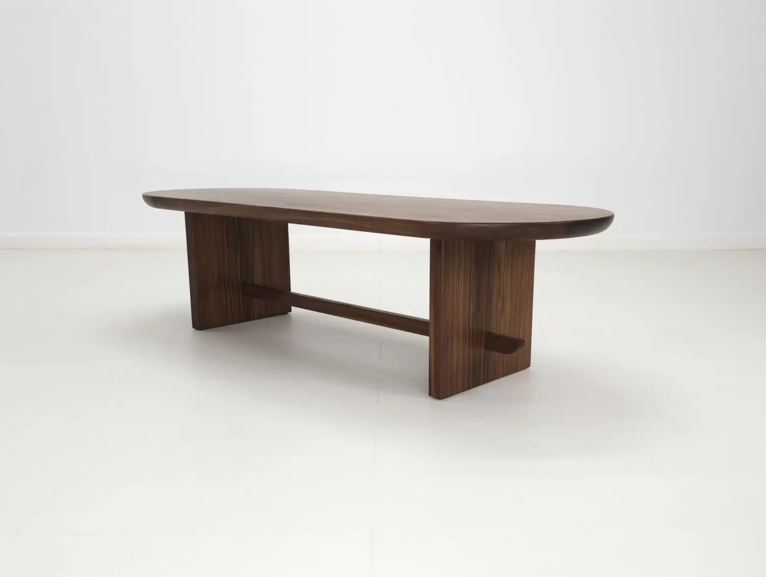 MIRA coffee table in solid American hardwood with a 1½ inch thick capsule shaped top