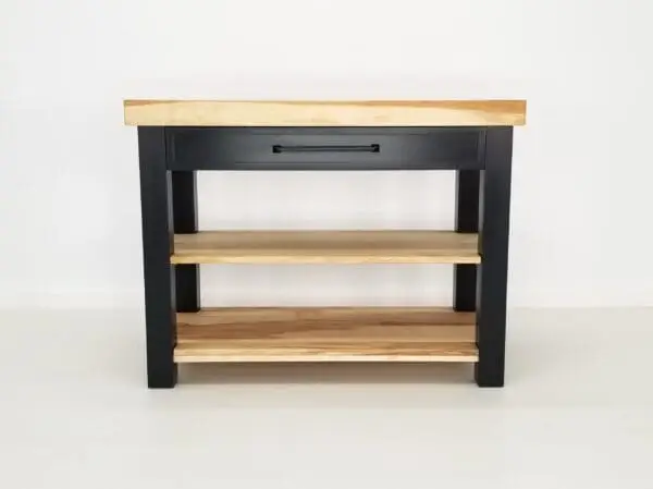 A black LOLO Butcher Block Kitchen Island or Cart with a maple butcher block shelf.