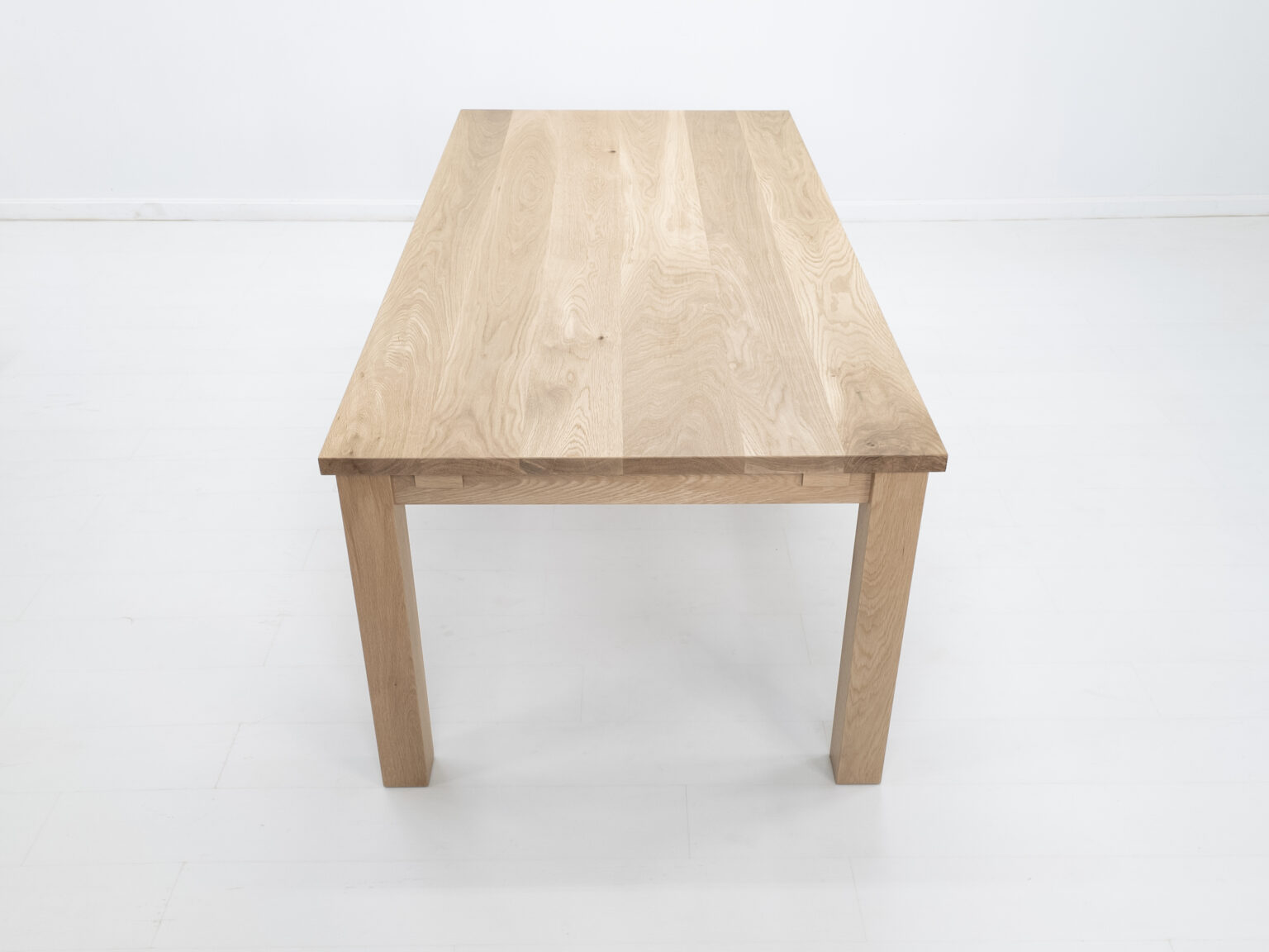 Light oak wood dining table