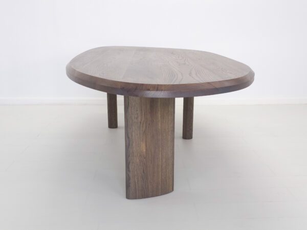 A freeform dining table.