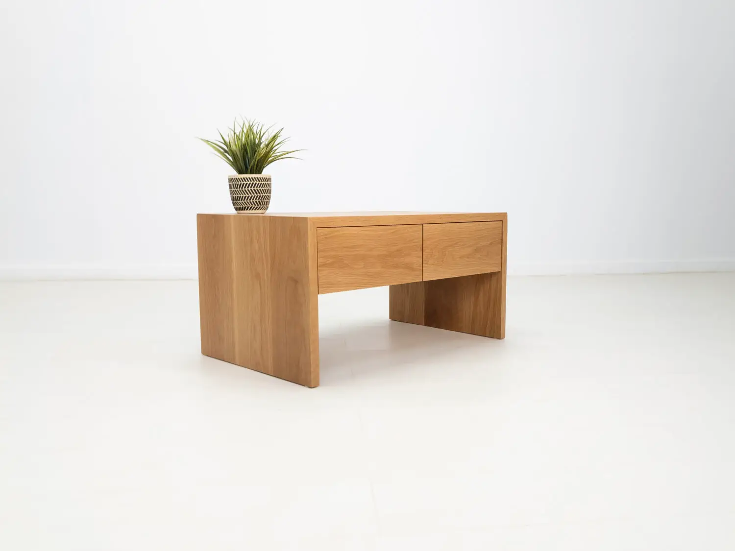 DREW coffee table in natural white oak featuring a seamless grain pattern and modern design