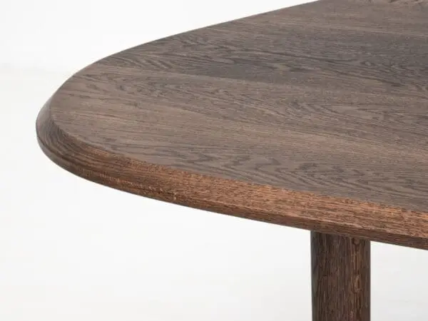 A freeform dining table.