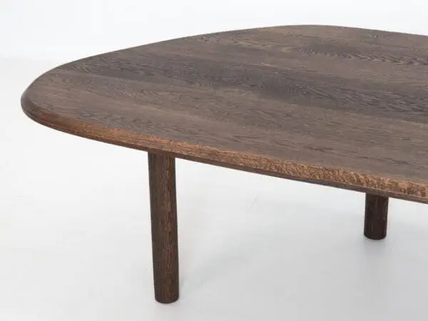 A freeform dining table.