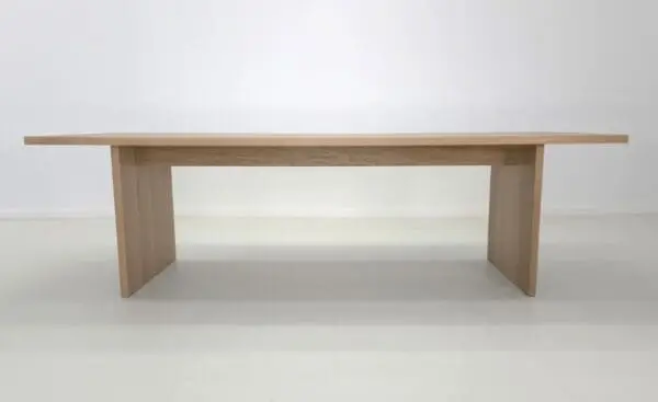 A white oak panel dining table.