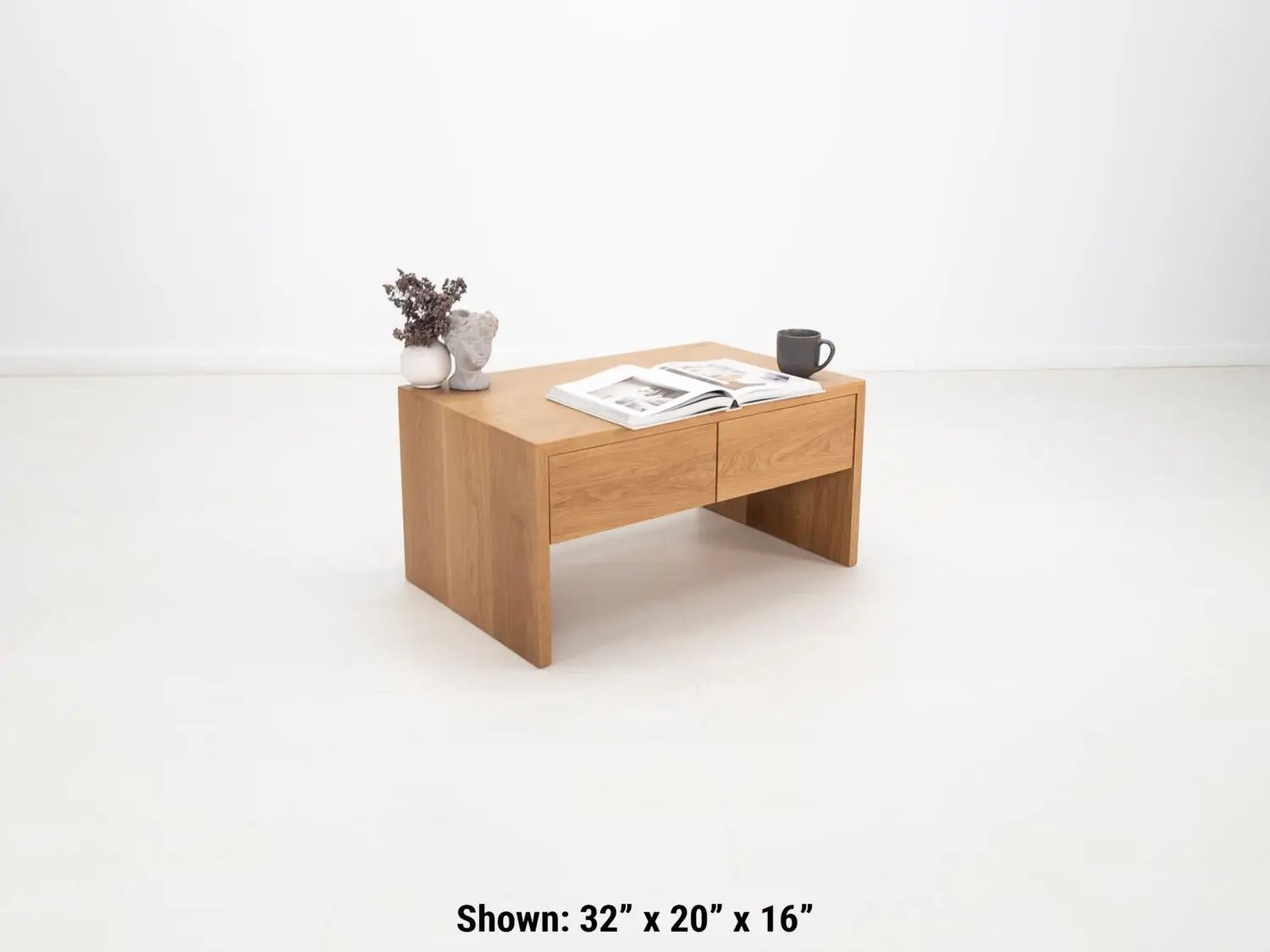 Modern white oak coffee table with a continuous grain pattern and sleek silhouette