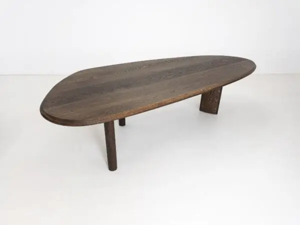 A freeform dining table.