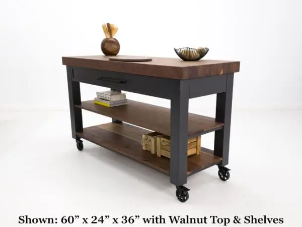 Walnut kitchen island with black frame and shelves.