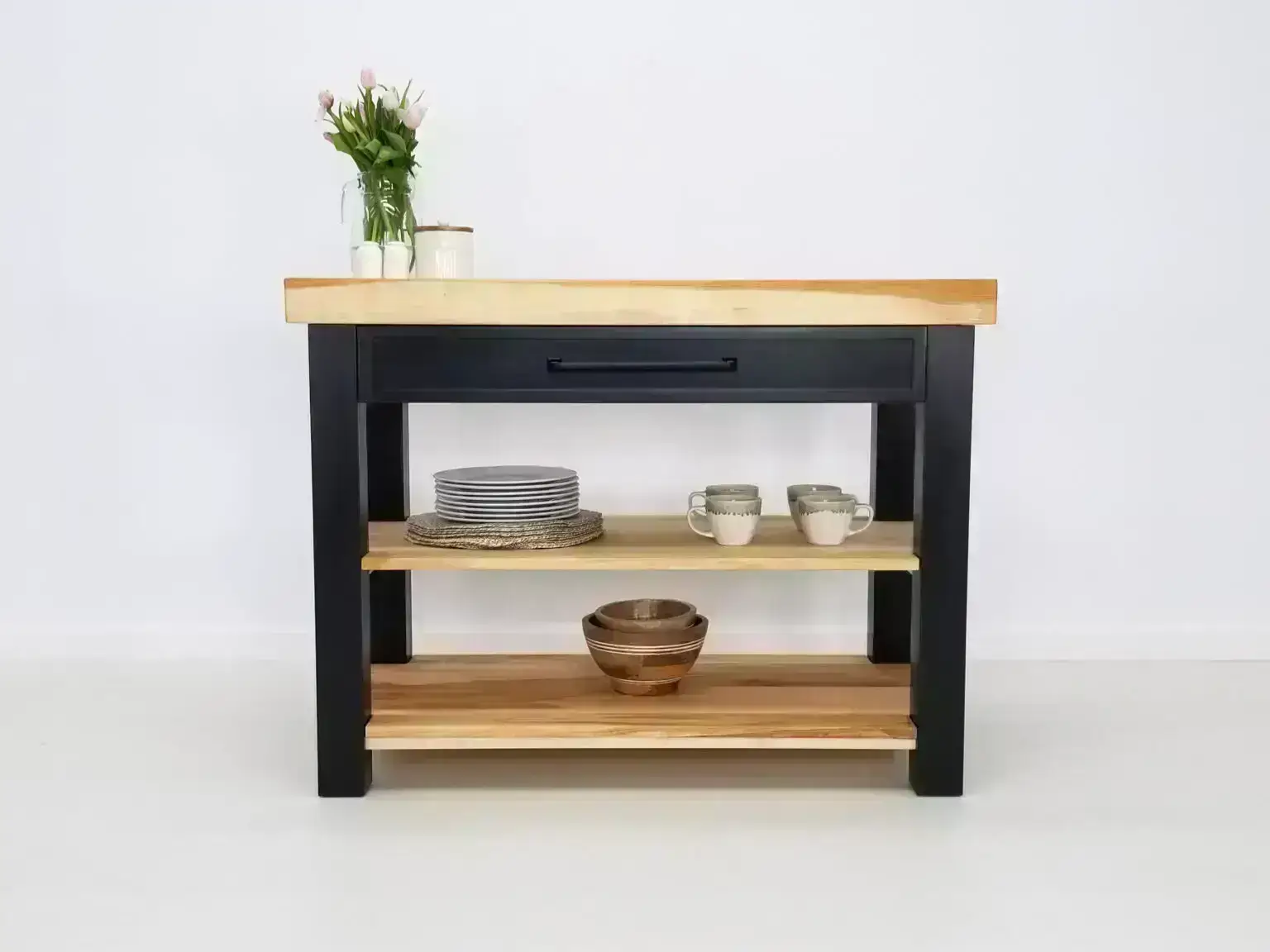 Handcrafted butcher block kitchen island made from solid maple with customizable options