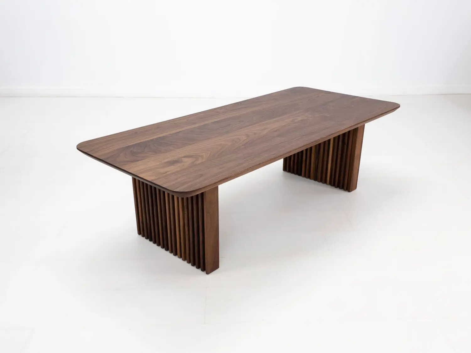 Handcrafted OWEN coffee table featuring an under beveled edge for a sleek modern look