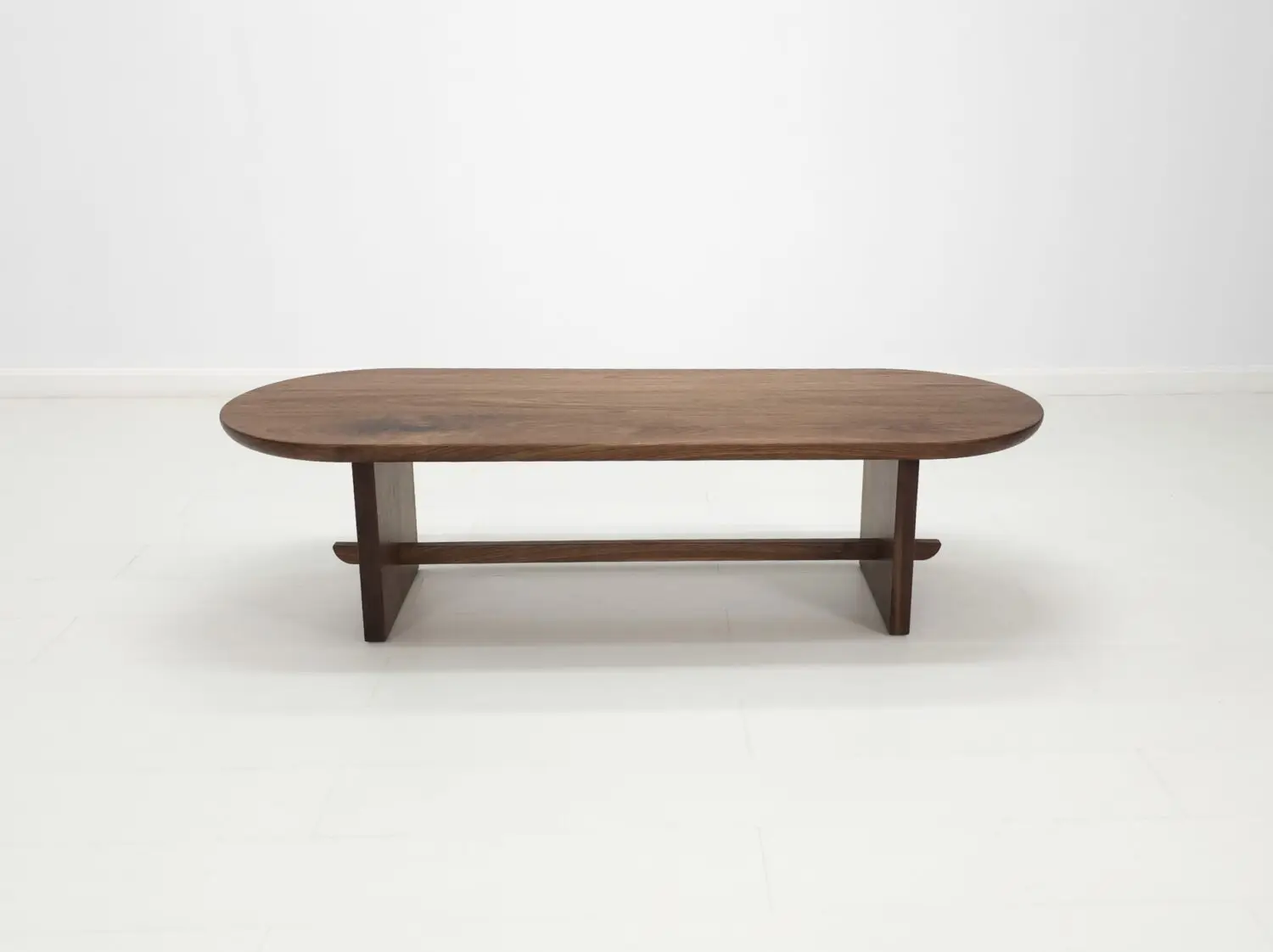 MIRA coffee table in solid American hardwood with a 1½ inch thick capsule shaped top