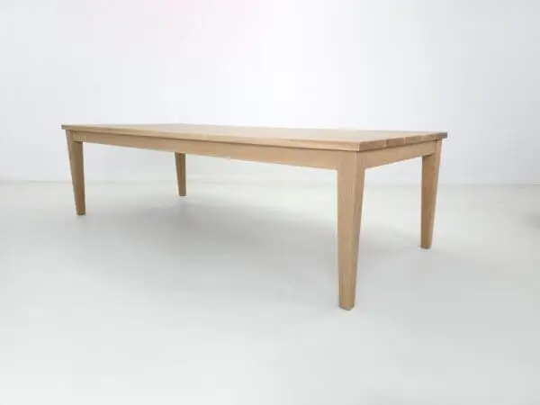 Wooden table with four legs.