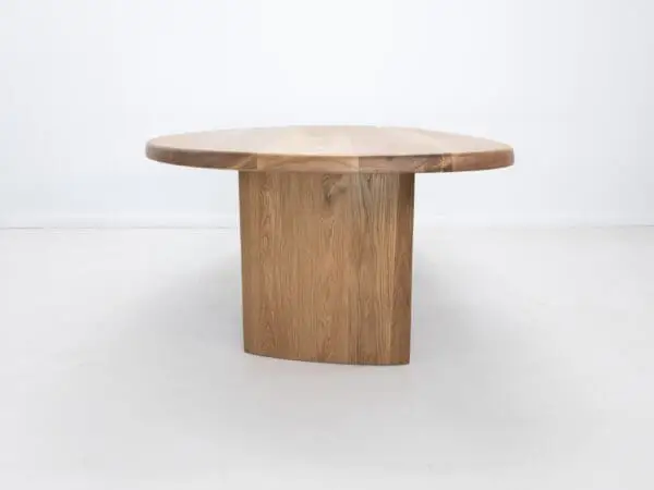 A close up of a freeform dining table.