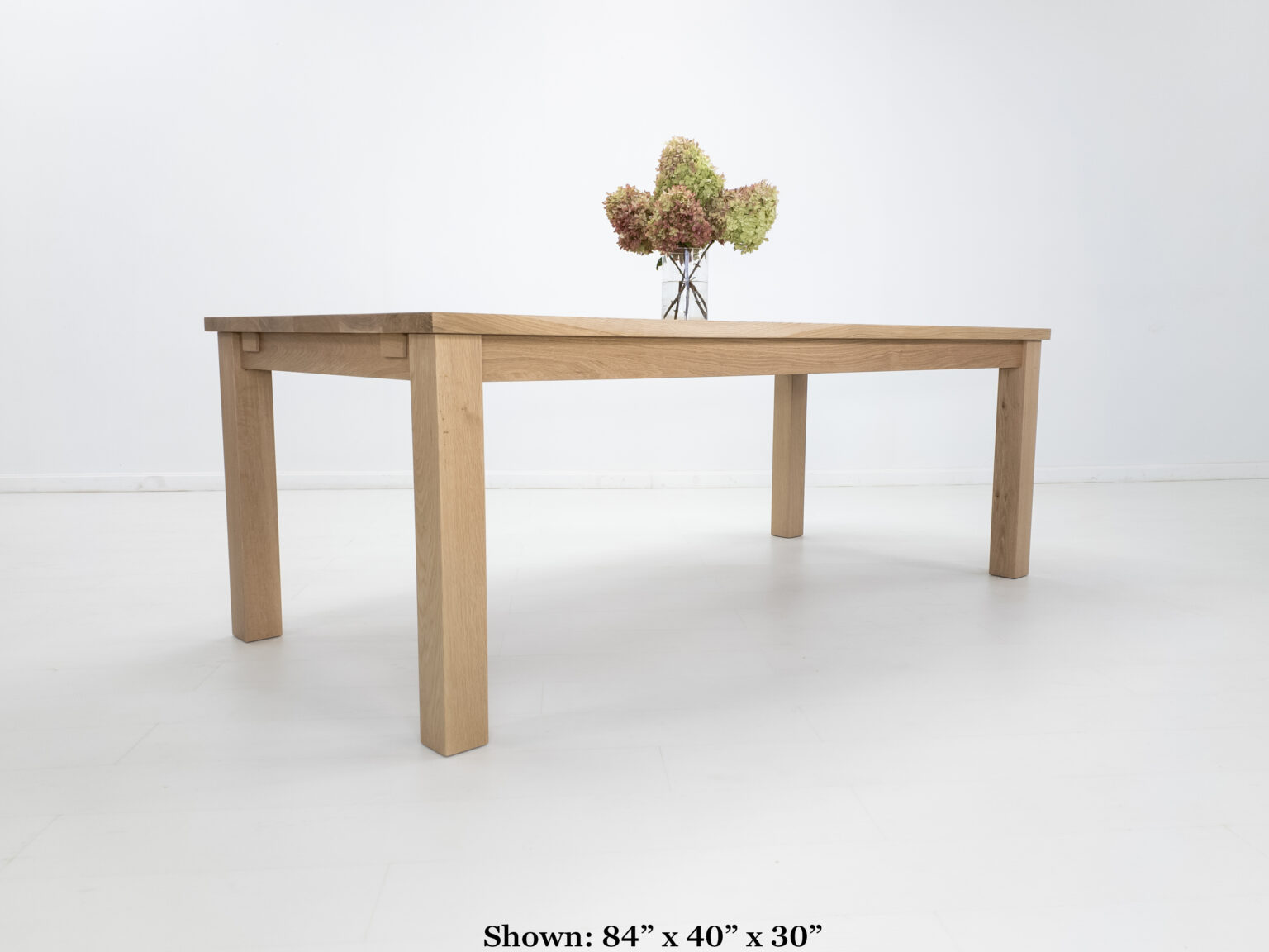 Oak dining table with flowers