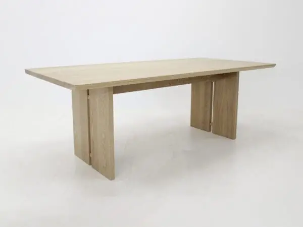 A panel table with split legs.