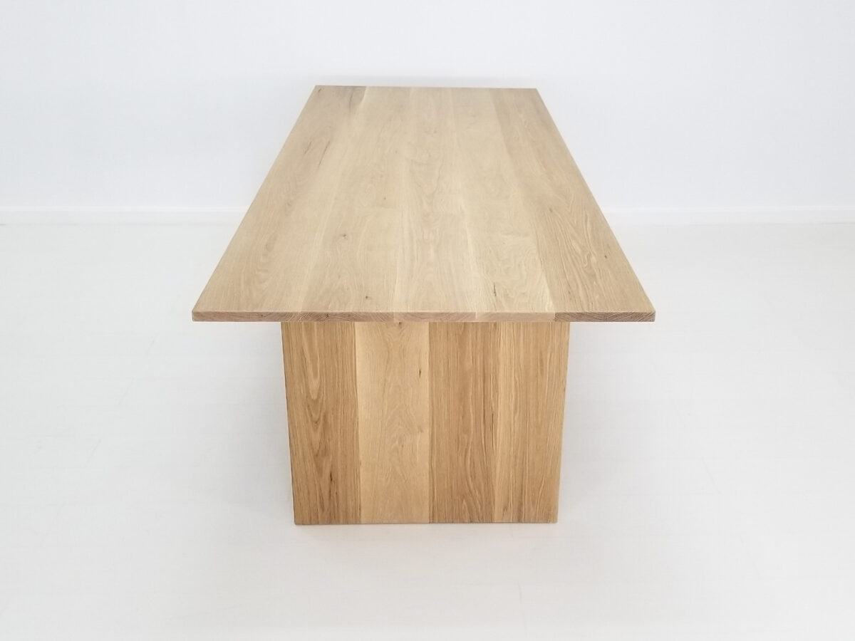 White oak LILY dining table featuring a durable solid wood design and dual stretchers for stability