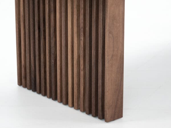 A close up of the ribbed legs on a coffee table.