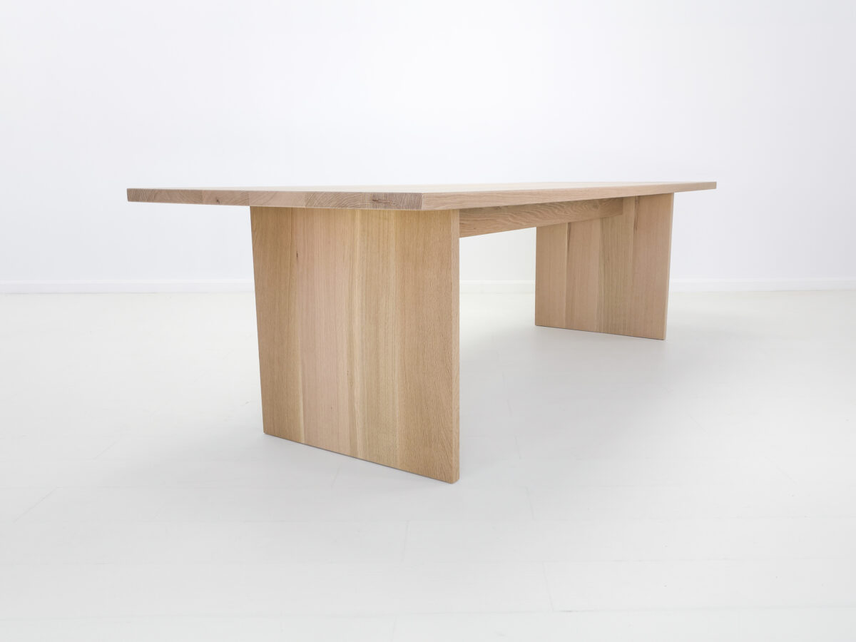 Custom LILY table in white oak showcasing its light tones and timeless design