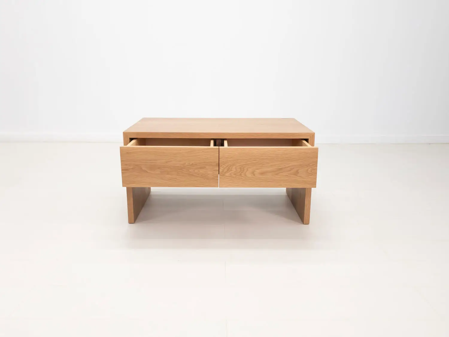 DREW coffee table in natural white oak featuring a seamless grain pattern and modern design