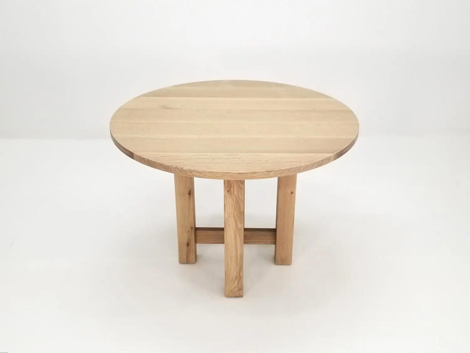 Solid wood round dining table with cross pedestal base handcrafted from American hardwood