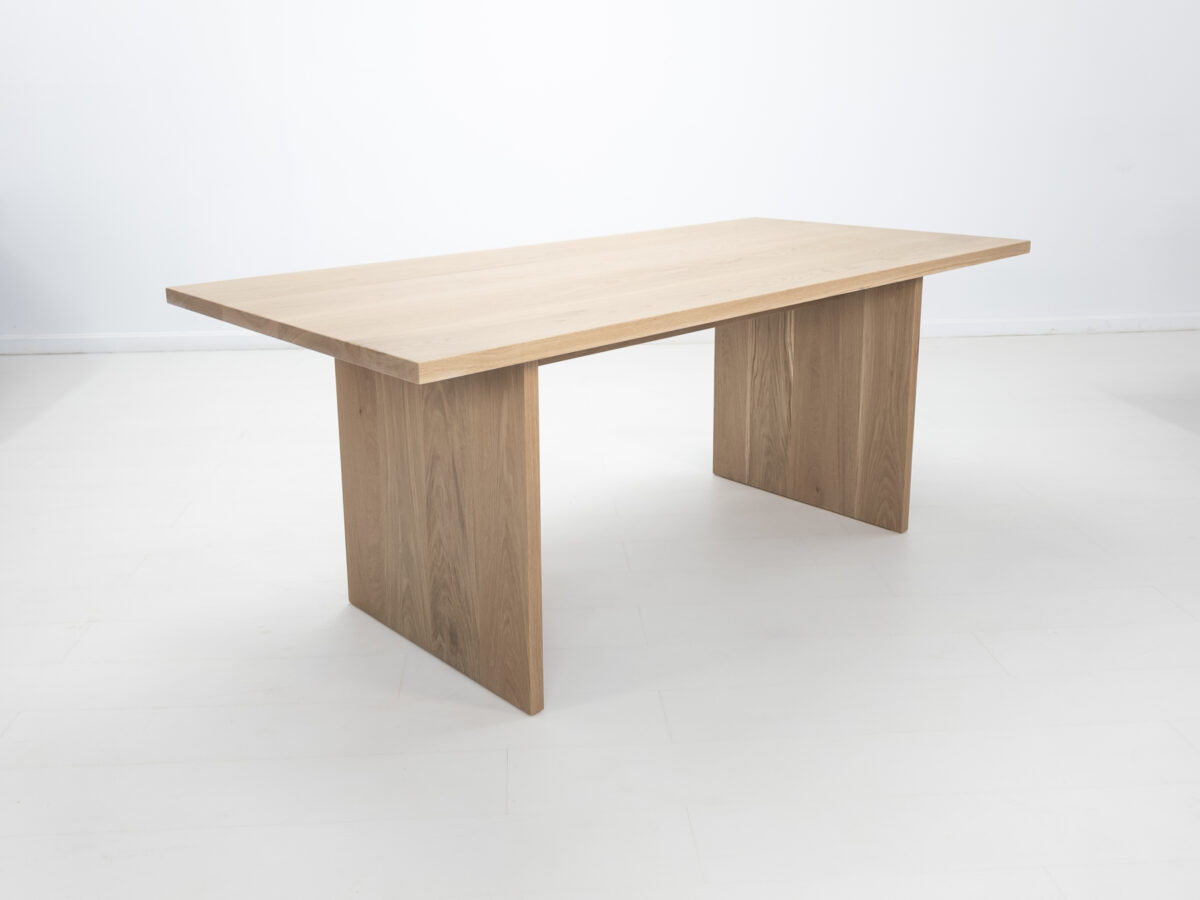 LILY dining table with a seamless 15 inch thick top and solid wood design
