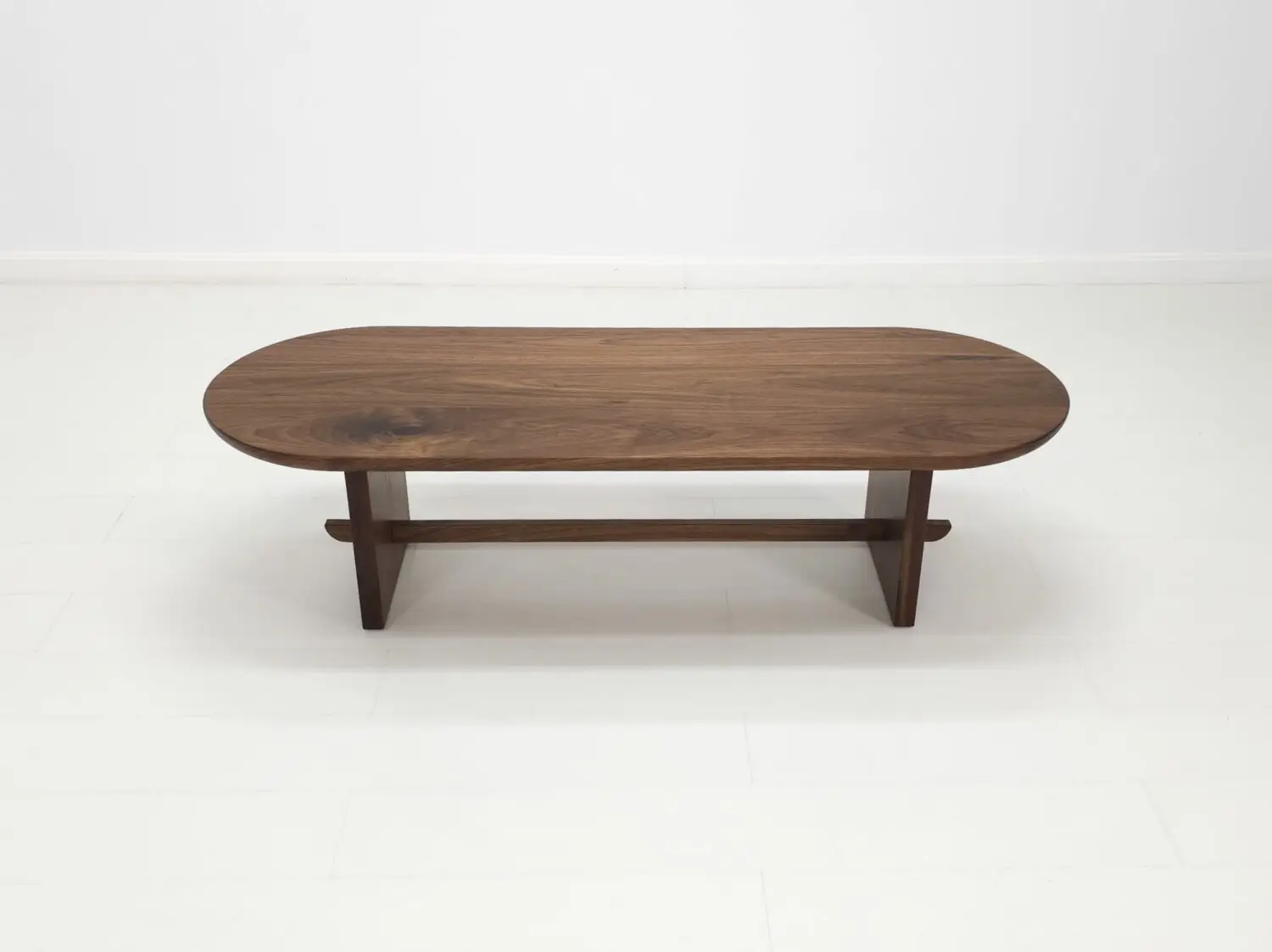 MIRA coffee table in solid American hardwood with a 1½ inch thick capsule shaped top