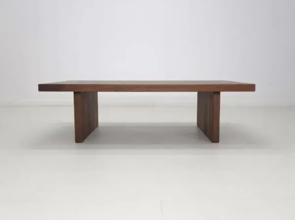 A long, wooden coffee table.