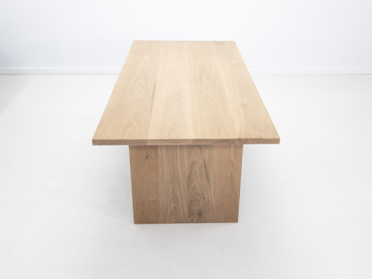 LILY dining table with a seamless 15 inch thick top and solid wood design