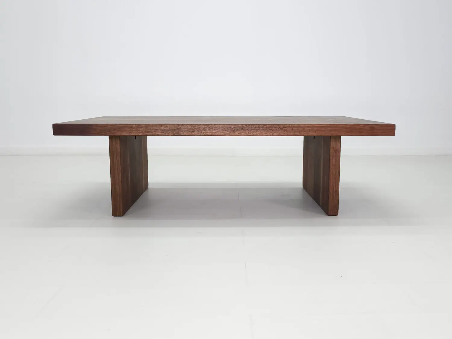 Walnut LILY coffee table finished with a water  and stain resistant hardwax oil