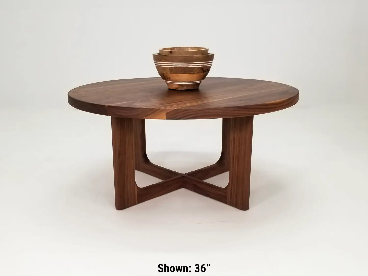 CARY coffee table in solid American hardwood with a 1⅜ inch thick round tabletop and open cross leg base