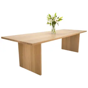 A panel dining table with flowers on top of it.