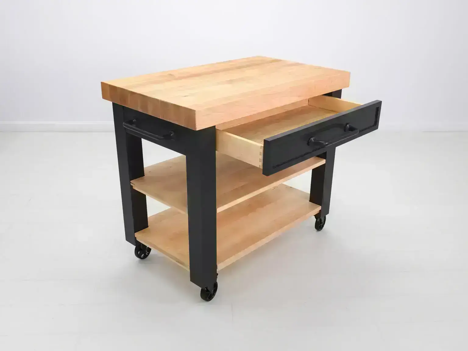 Wooden kitchen cart with open drawer