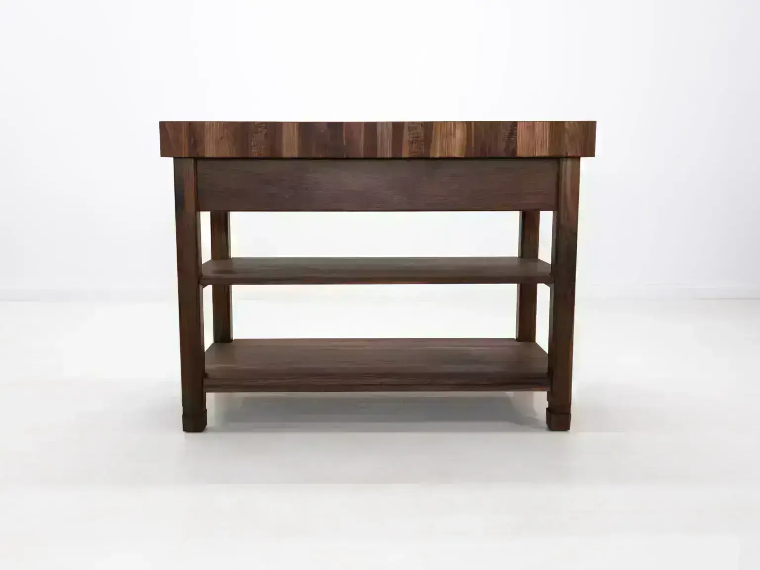 Custom WALT butcher block kitchen island with 4 inch thick walnut top