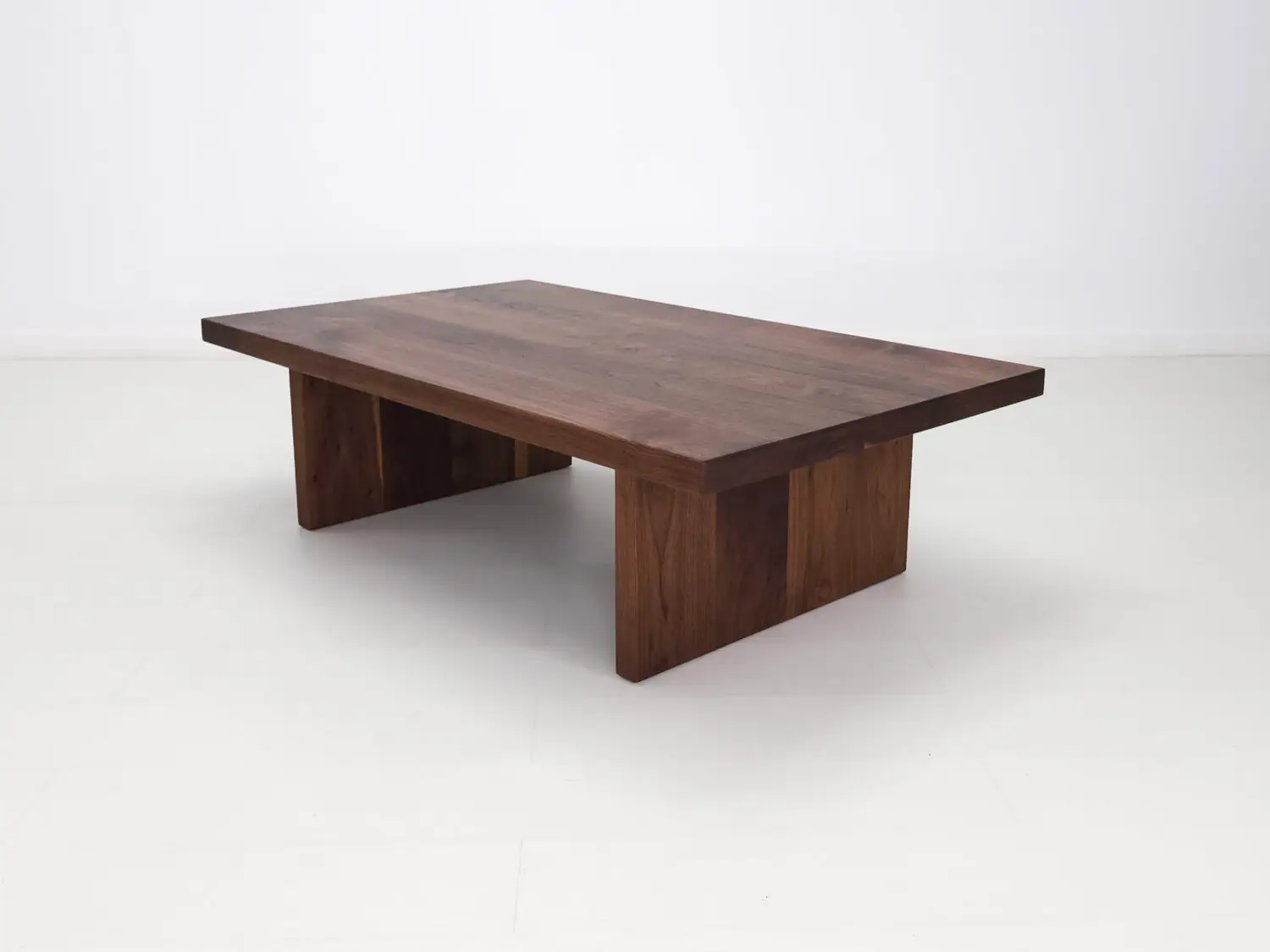 Walnut LILY coffee table finished with a water  and stain resistant hardwax oil