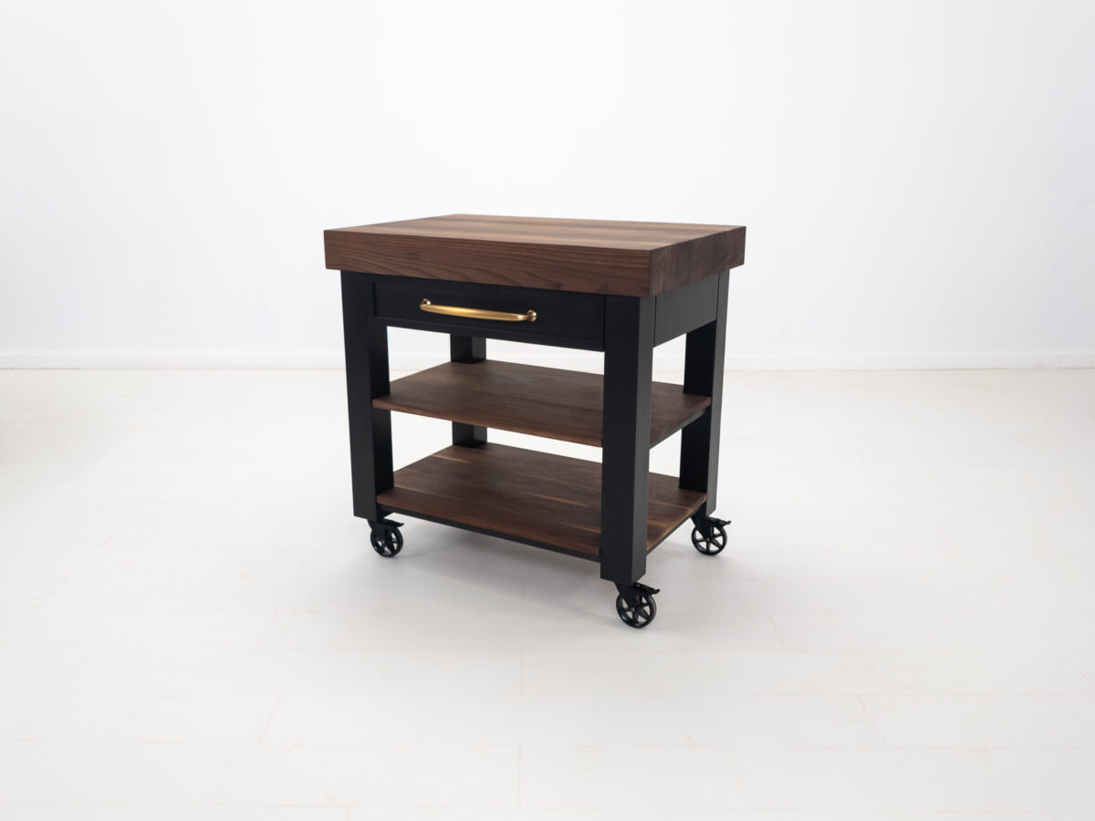 Portable butcher block cart featuring a solid walnut and customizable hardware