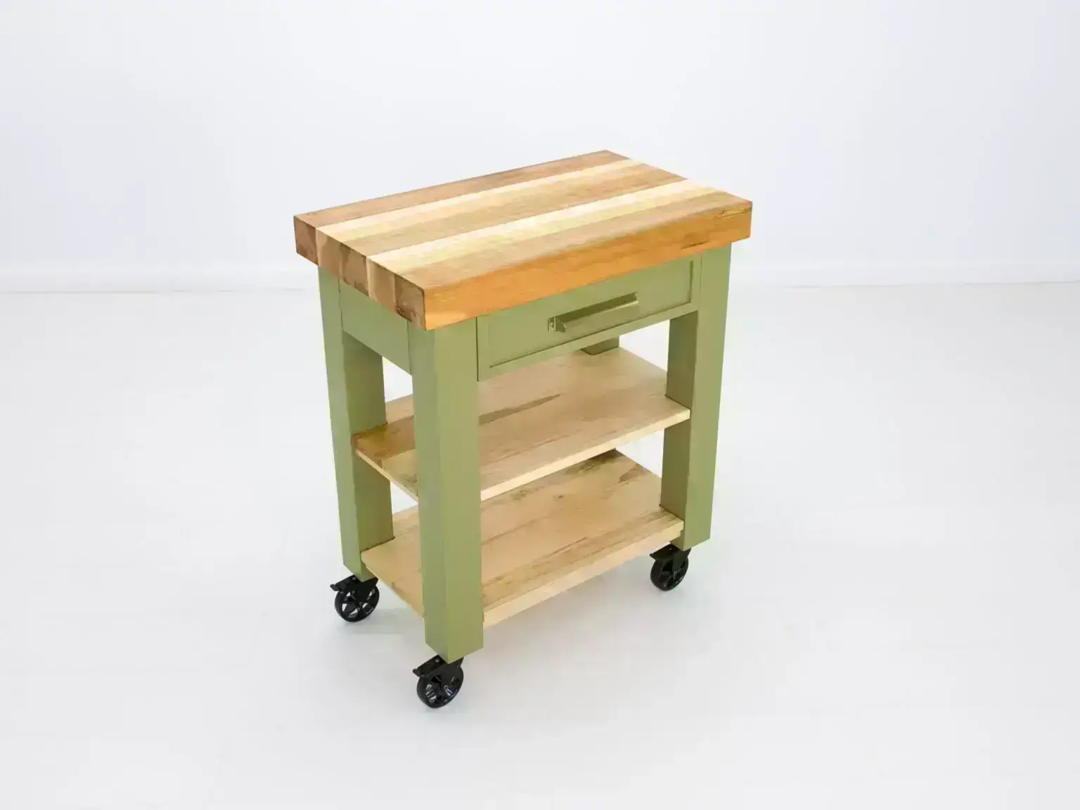 Compact Chef butcher block cart with solid maple construction and mobility casters