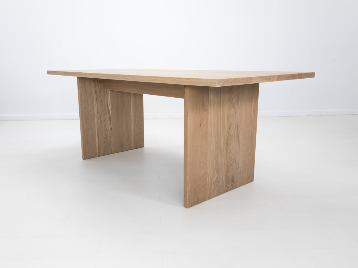 LILY dining table with a seamless 15 inch thick top and solid wood design