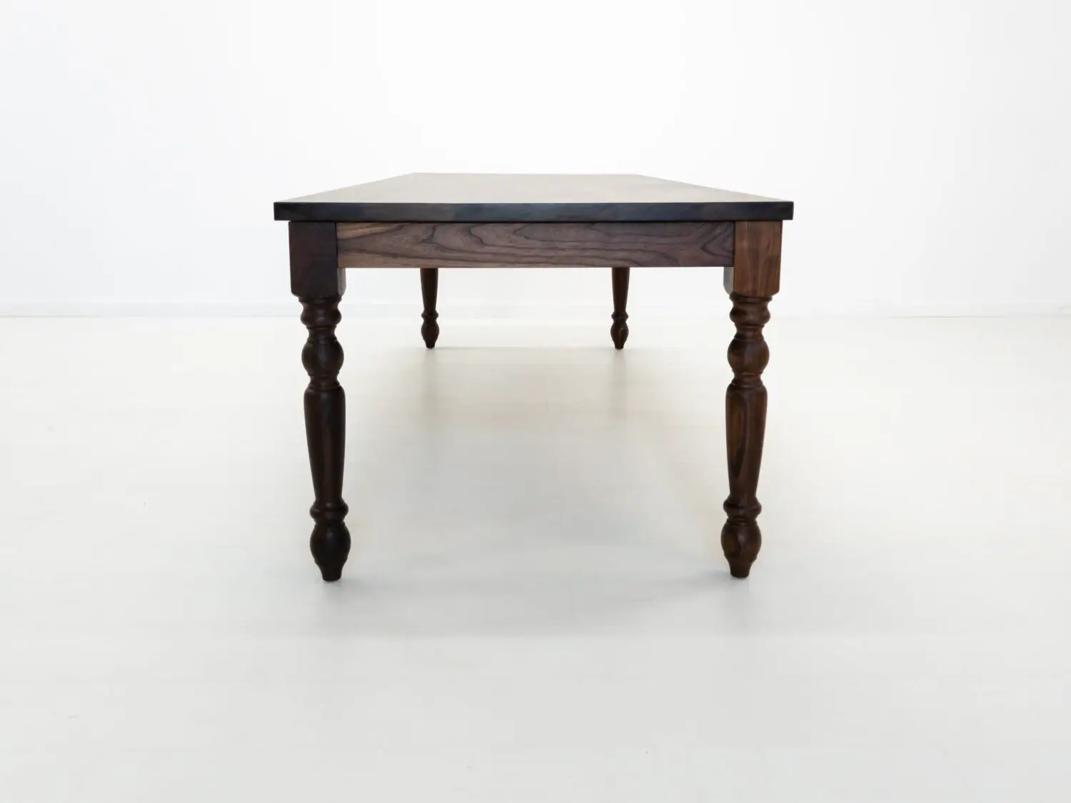 TESS dining table in natural oiled walnut with classic turned legs handcrafted from premium American hardwoods