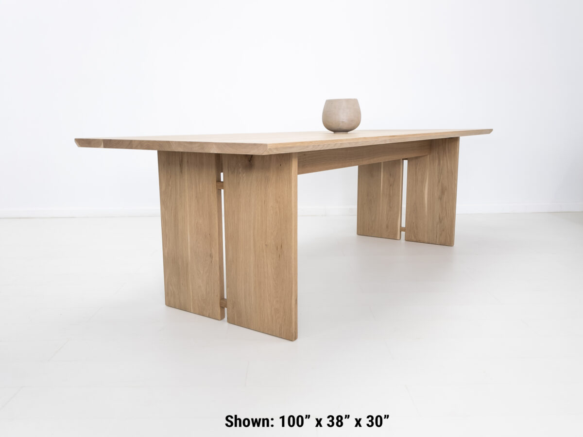 DIVI dining table handcrafted from premium American hardwoods with a 15 inch thick top and unique split leg design