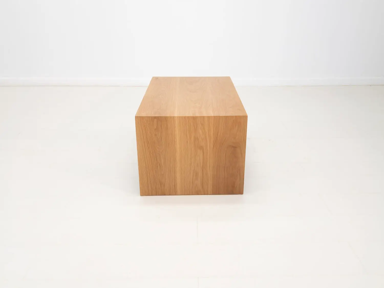 DREW coffee table in natural white oak featuring a seamless grain pattern and modern design