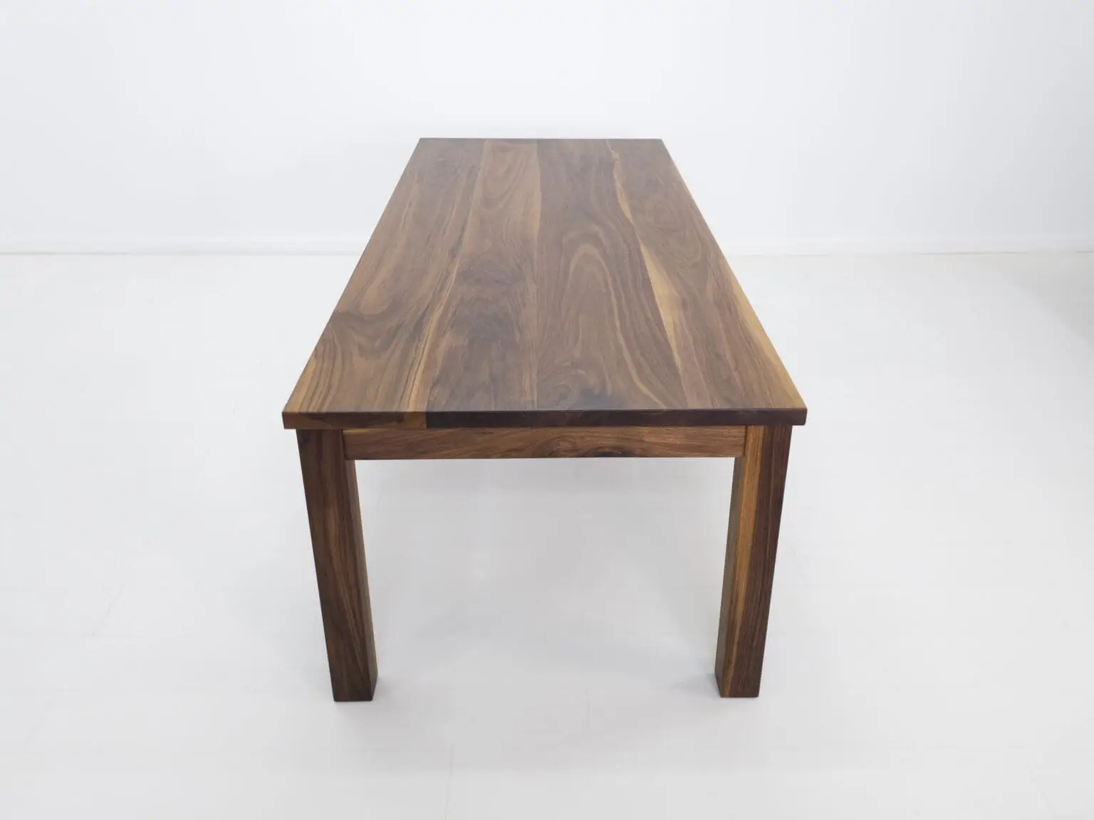 A walnut dining table