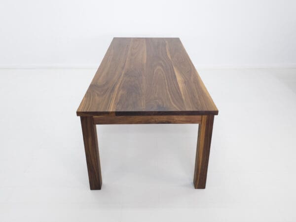 A walnut dining table.
