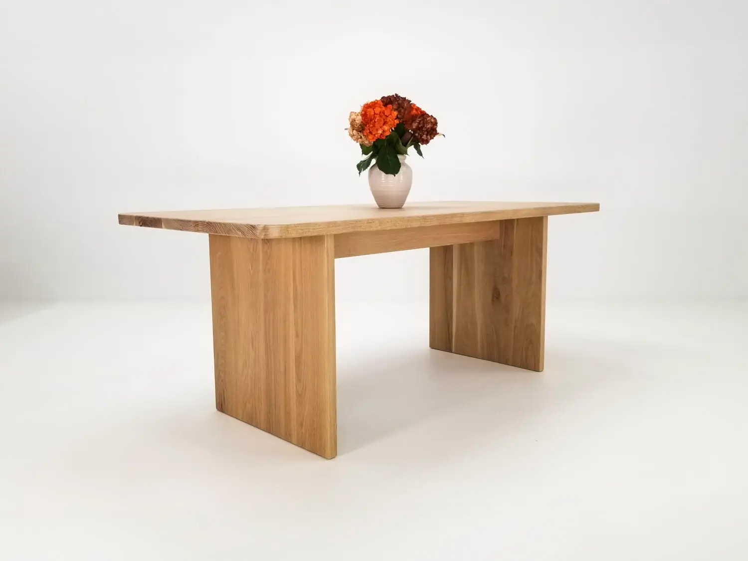 Custom made TIAN dining table crafted from premium American hardwood