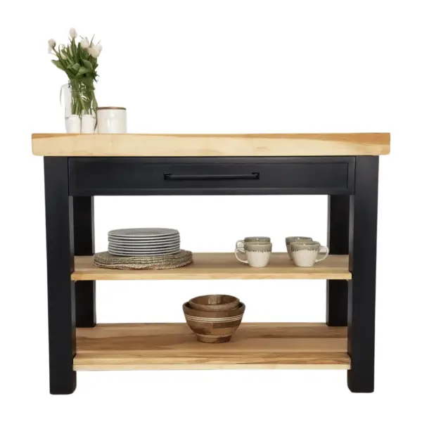 Black kitchen island with wood top and shelves.