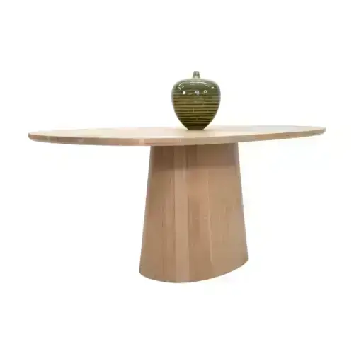 Wooden oval table with green vase